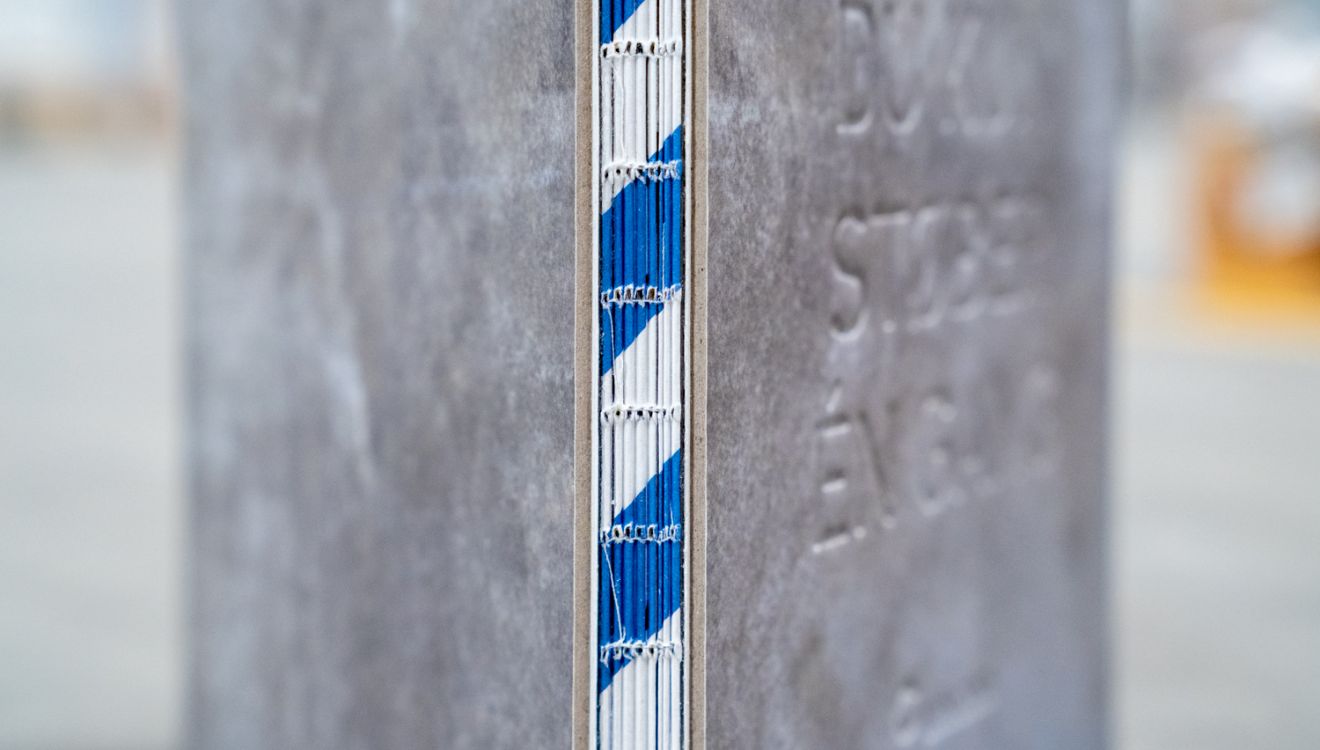 Stibo Complete - Solid merkevareidentitet støpt i papir med betongestetikk